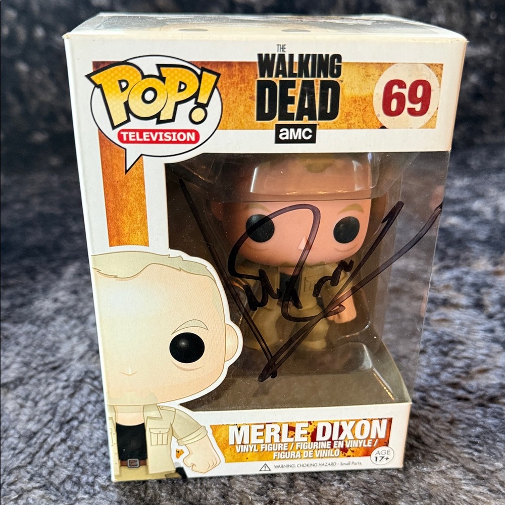 Merle Dixon Funko Pop Television #69 autographed by Michael Rooker